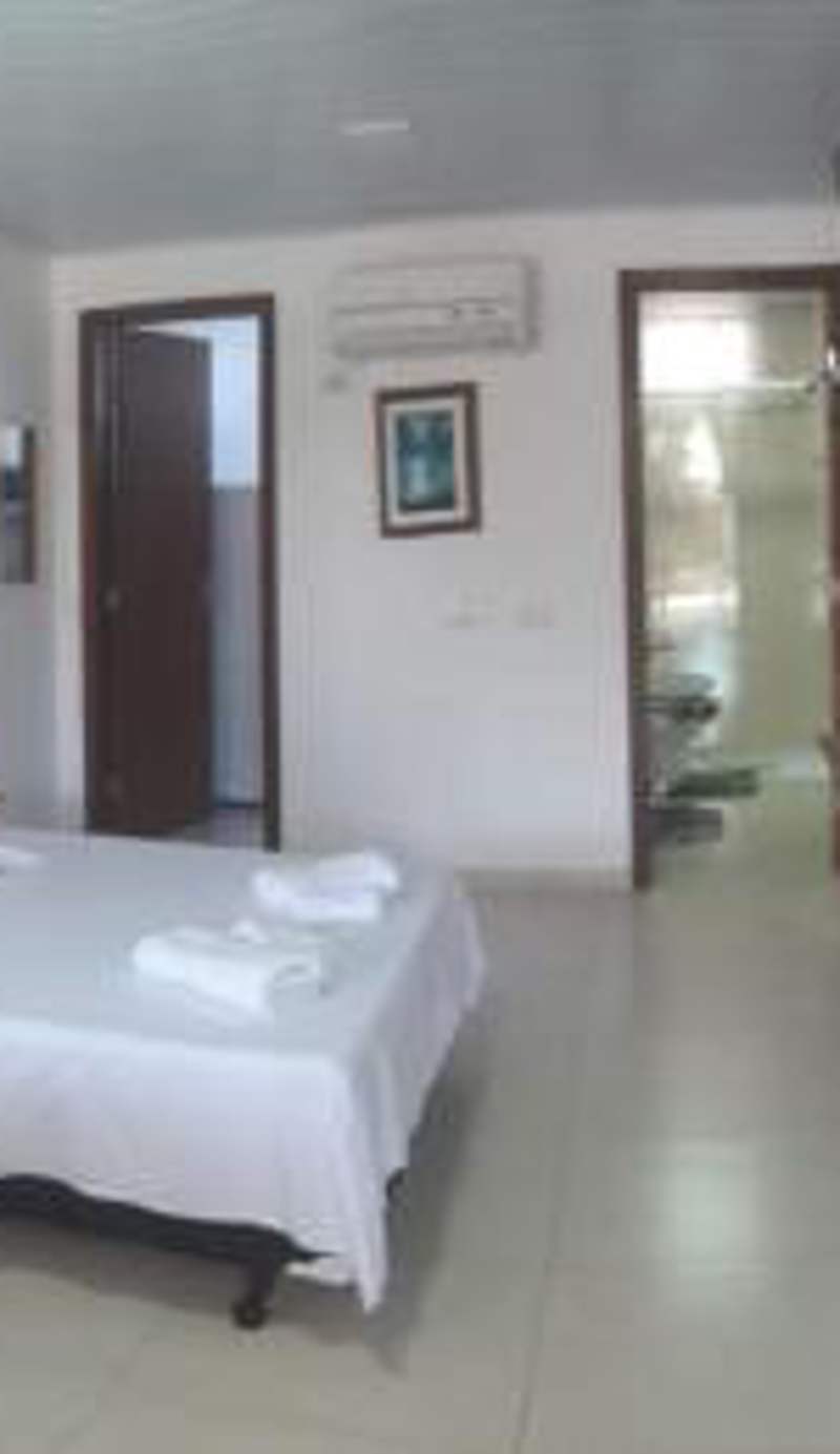 Flats Paulo & Neia Suite e cozinha