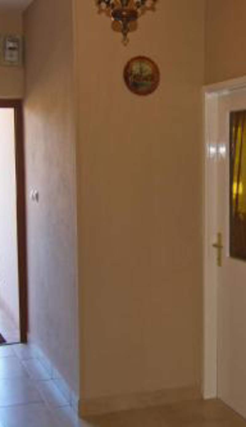 Apartment and Rooms Toka
