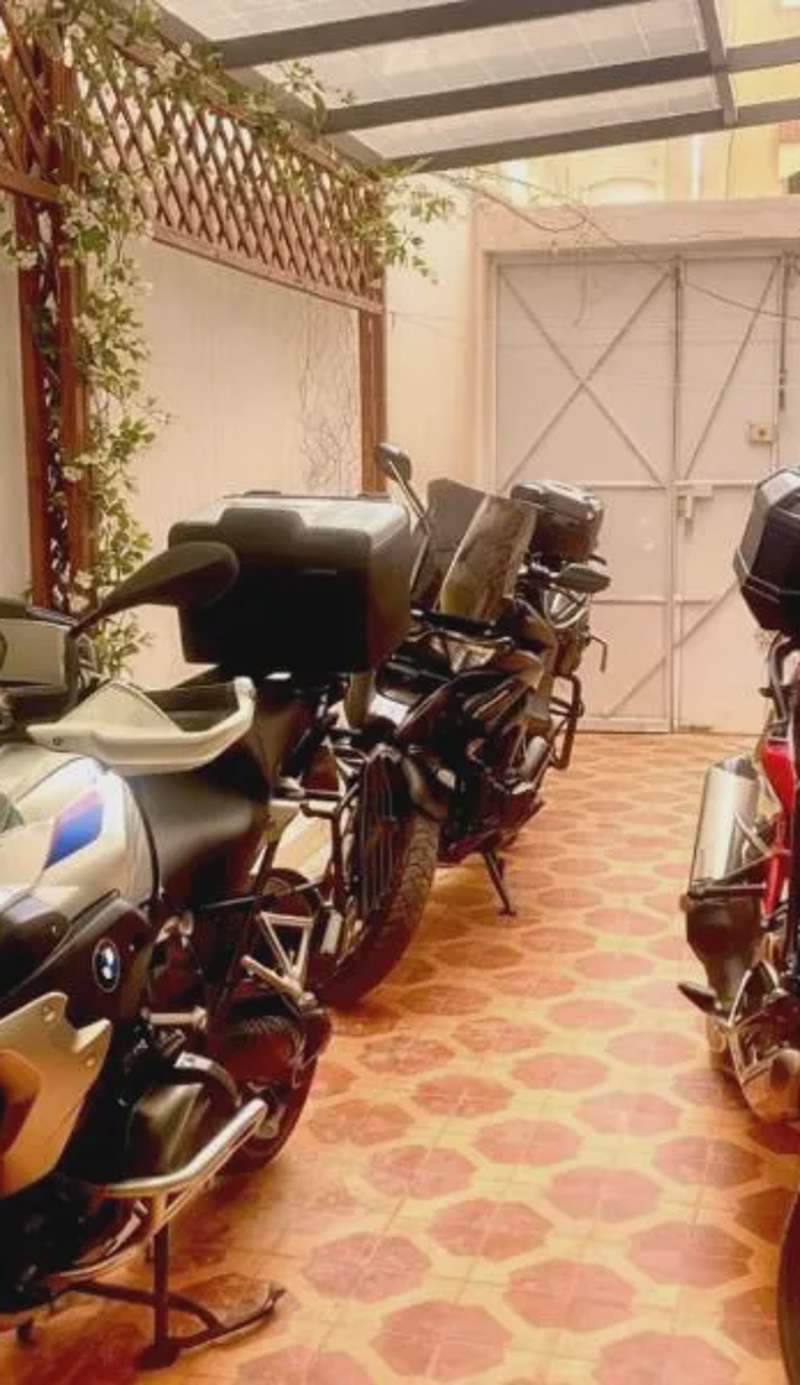 Spacious Apartment with Motorcycle Garage, Free Parking, and Air Conditioning