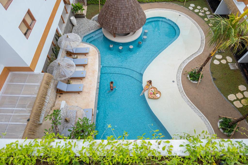 Roomates Beach Hostel Canggu by Ini Vie Hospitality photo 2