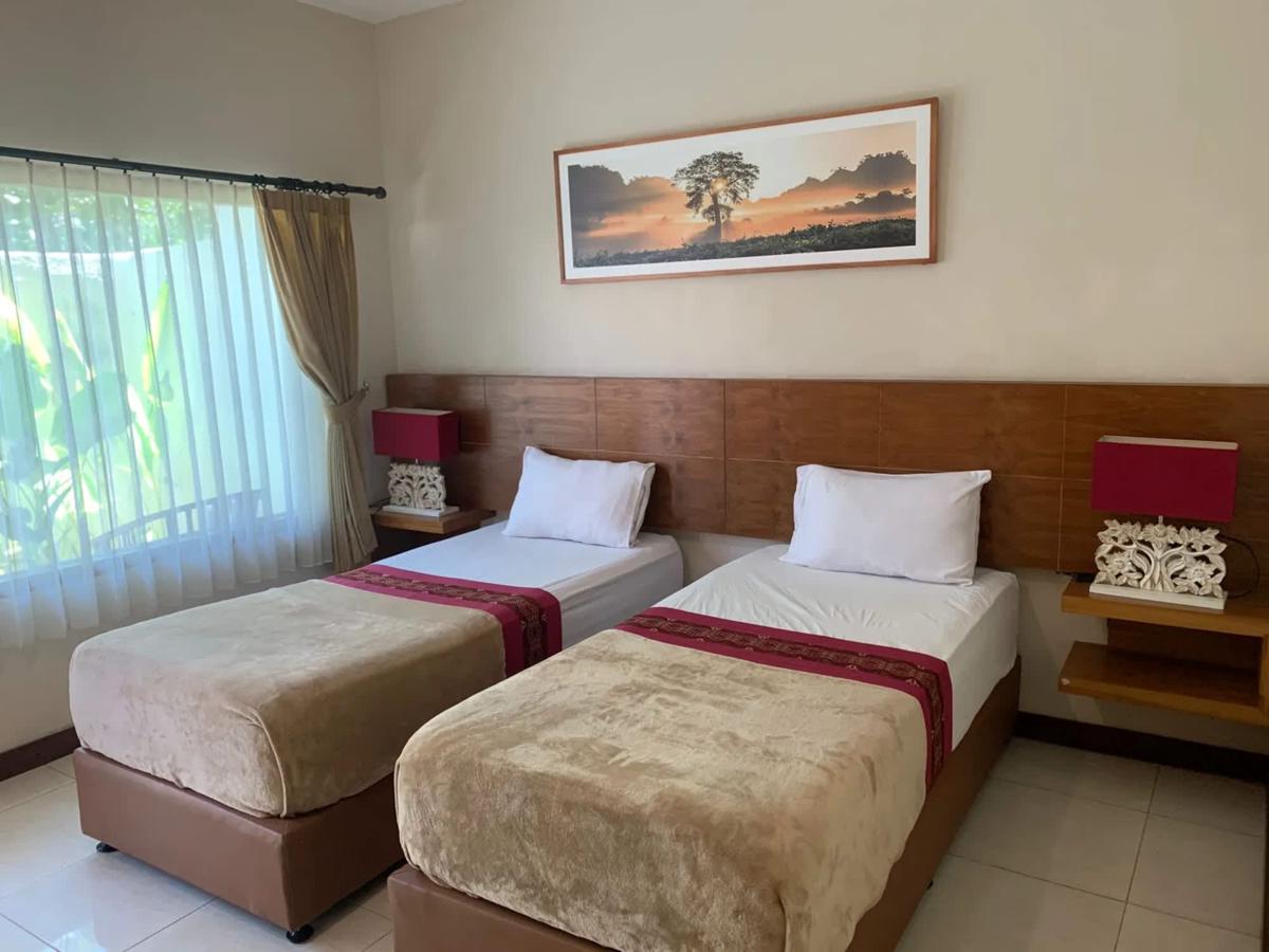 Kuta Suci Guesthouse photo 4