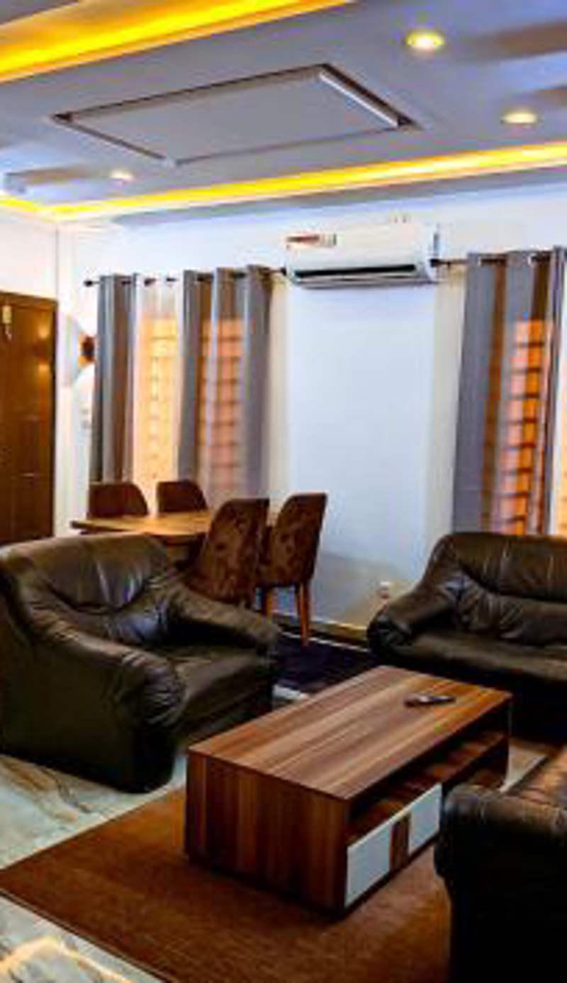 Spacious Apt with Patio & Rooftop in Cité Baguida